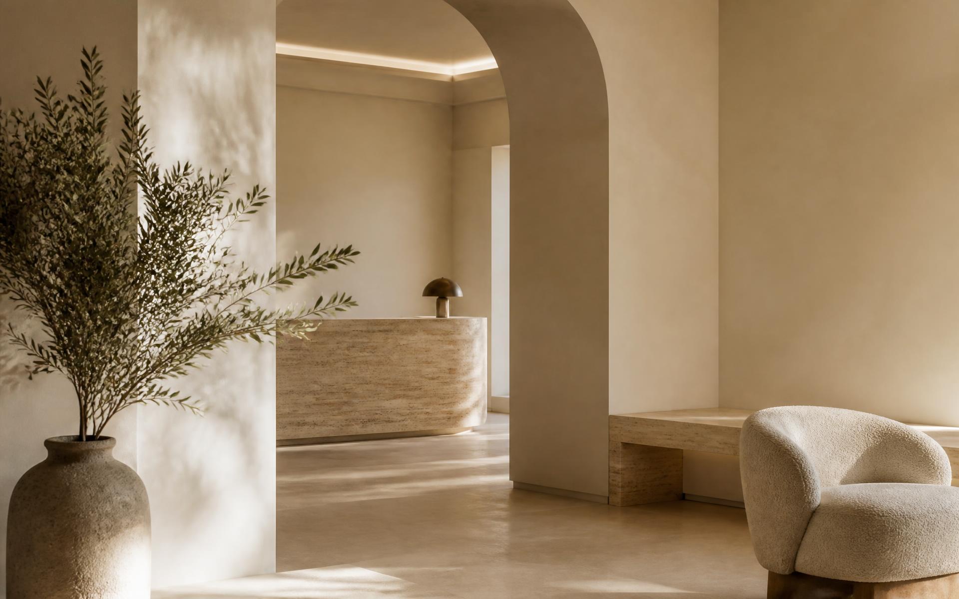 The MECCA clinic reception, finished in warm plaster and travertine